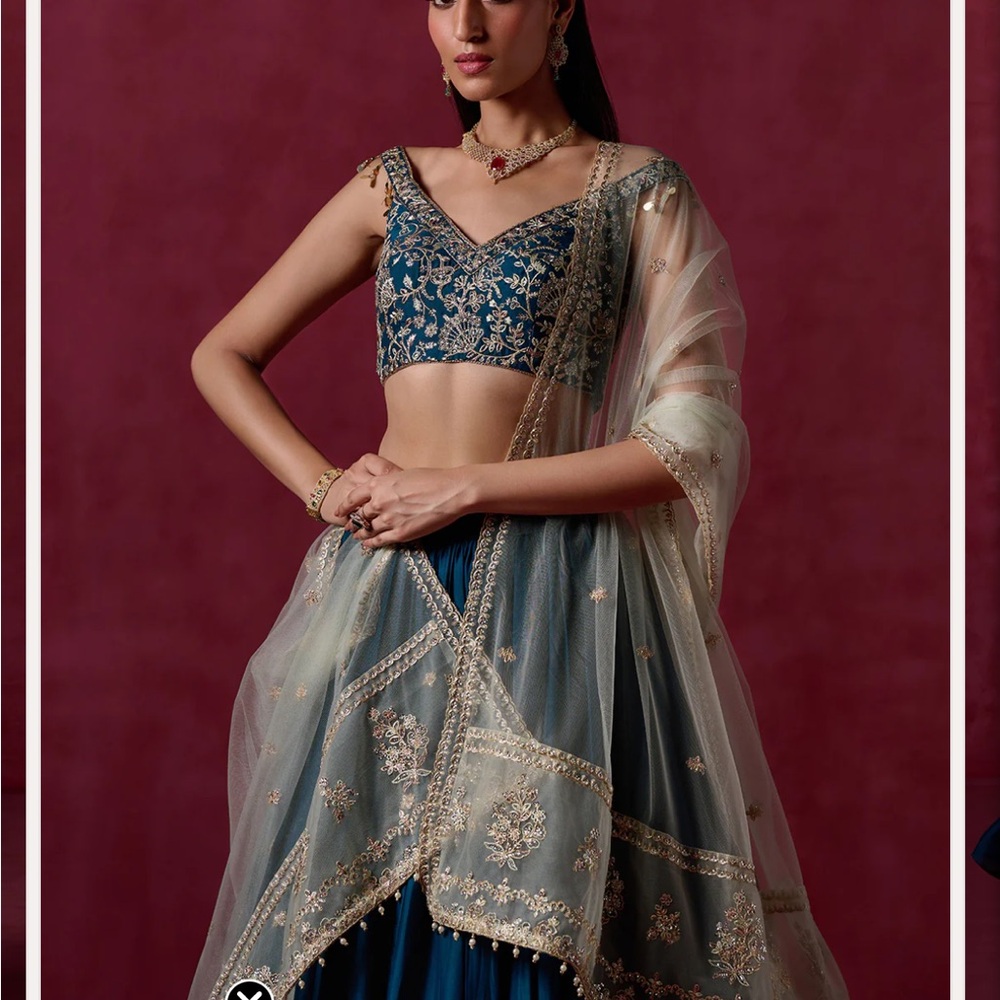 Teal Green Embroidered Crepe Silk Lehenga